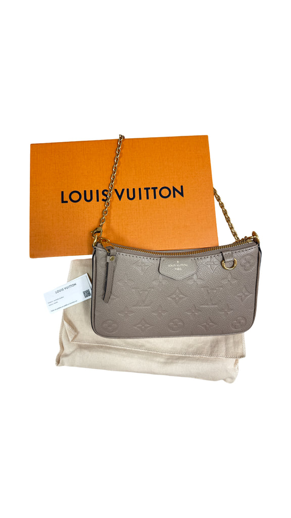 LOUIS VUITTON MONOGRAM EMPREINTE EASY POUCH ON STRAP IN TURTLEDOVE