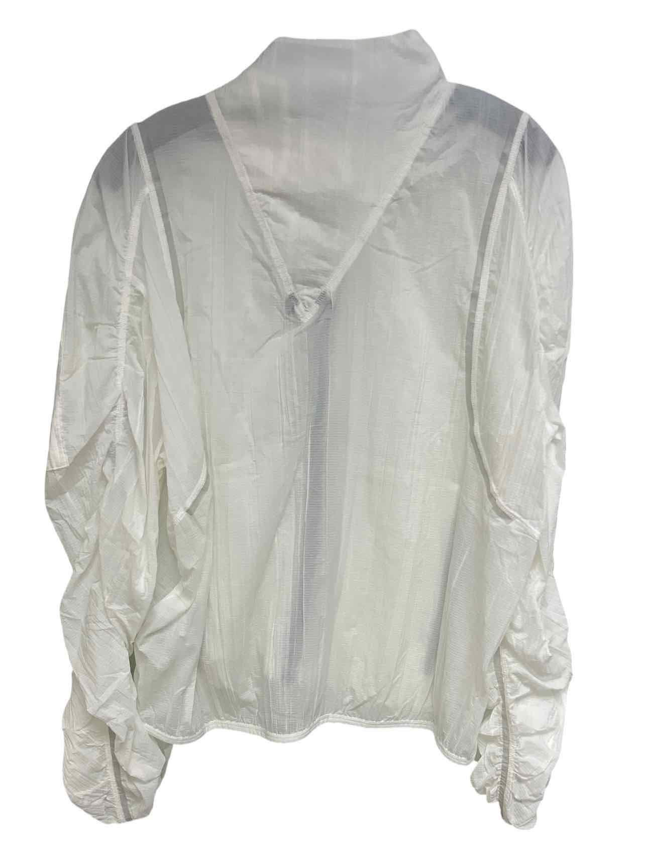 FREE PEOPLE  NWT! GREAT ESCAPE RUN WINDBREAKER ARCTIC WHITE SIZE: XL